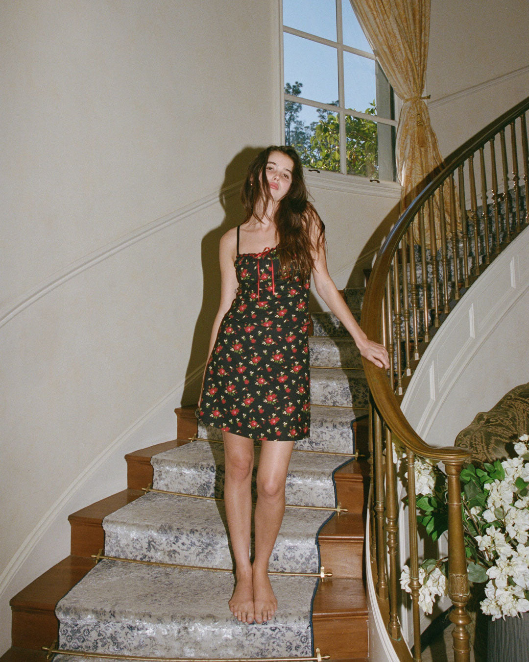 Hazel Midi Skirt in Fleur knee-length A line black floral skirt with side zipper and scalloped lace waistband