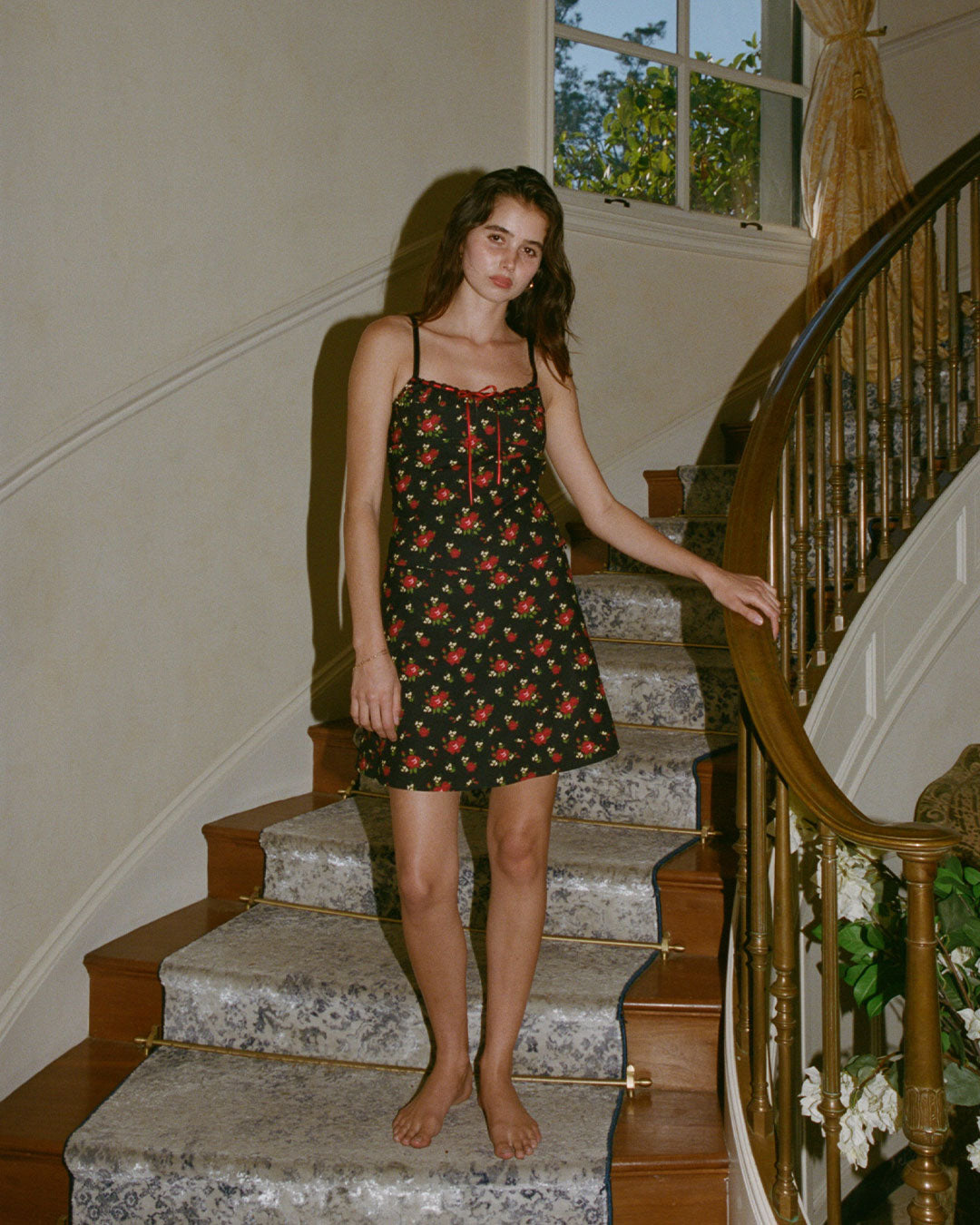 Hazel Midi Skirt in Fleur knee-length A line black floral skirt with side zipper and scalloped lace waistband