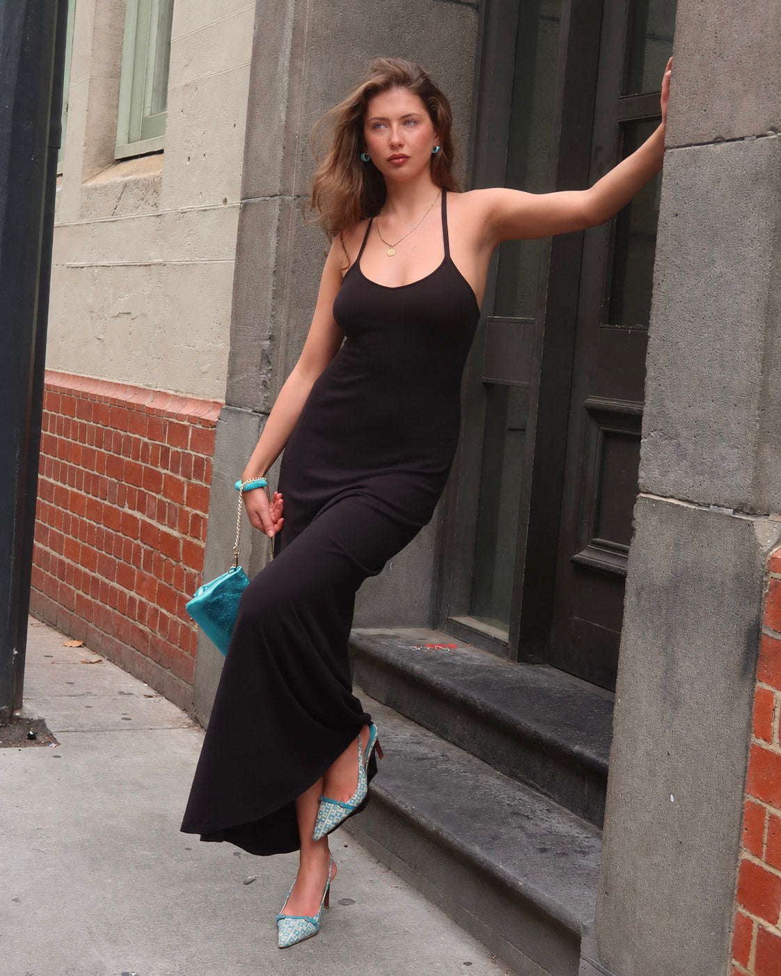 Madeline knit maxi dress in black featuring open back and sweetheard neckline.
