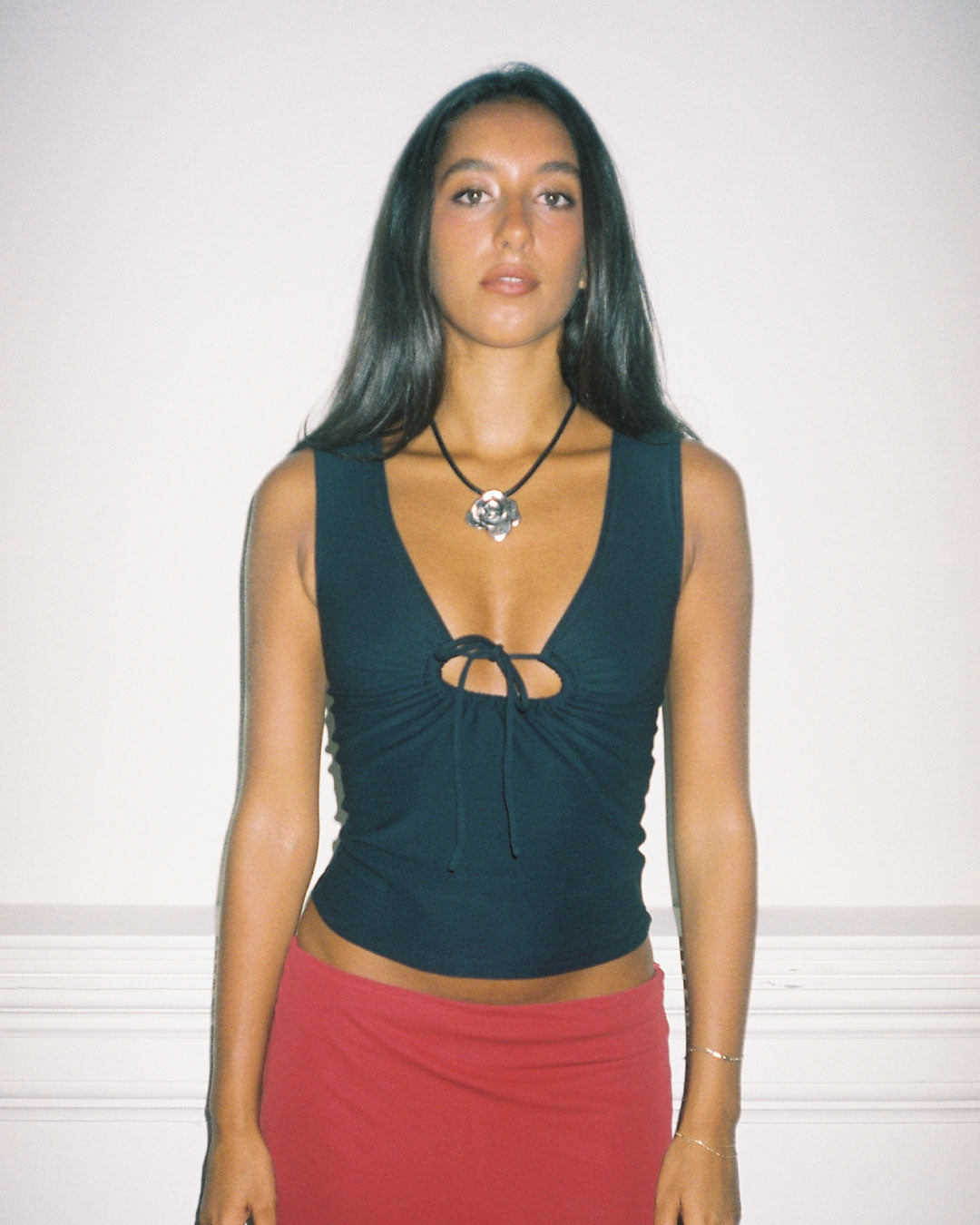 Dolly Top sculpting silhouette with adjustable centre-front keyhole