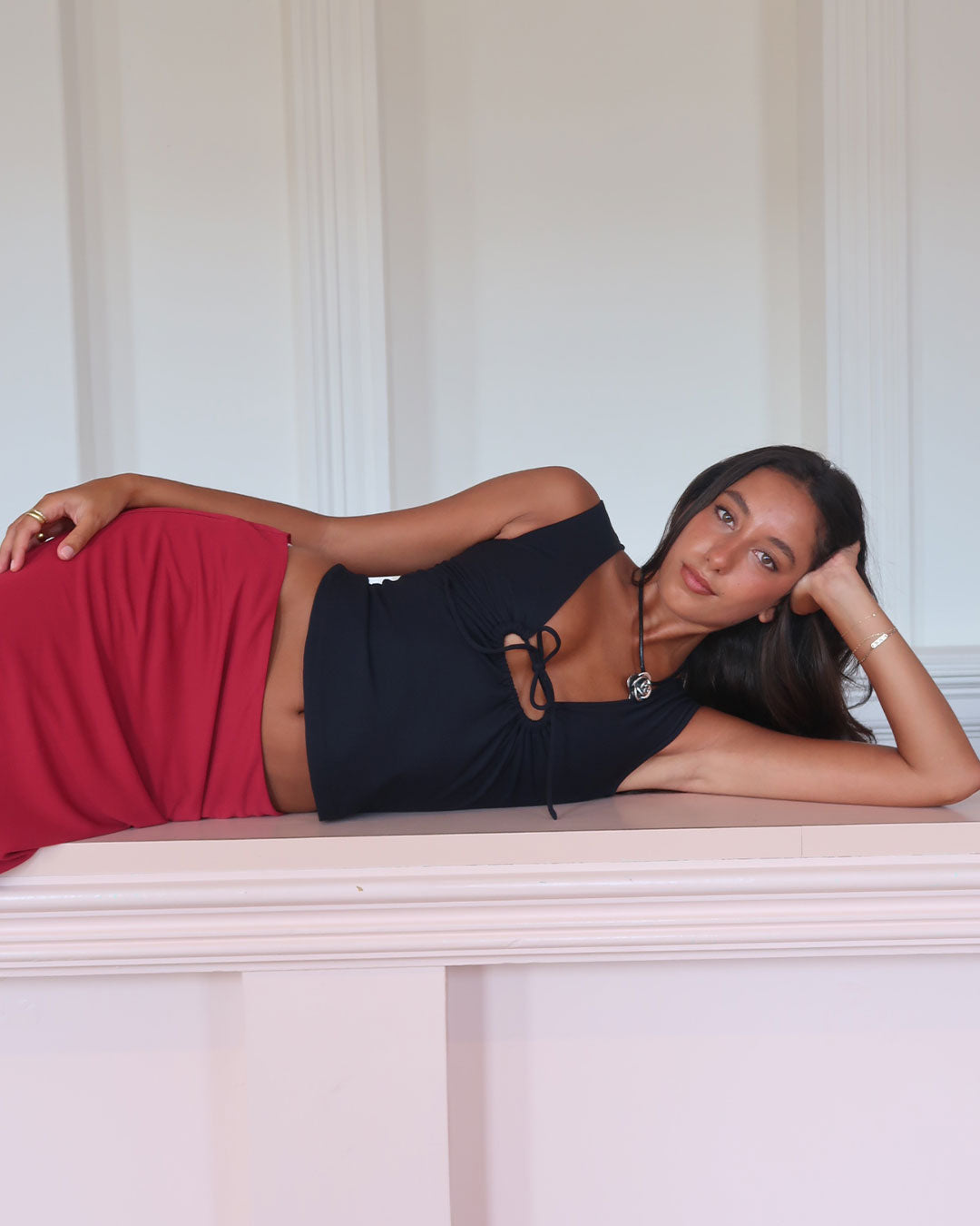 Dolly Top sculpting silhouette with adjustable centre-front keyhole