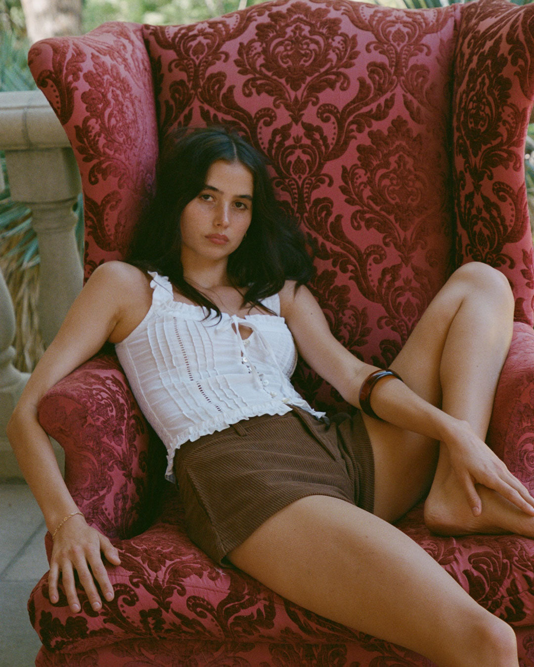 Eliza Top in Bianco white resort blouse with lace paneling, button-up front, and ruffled hem